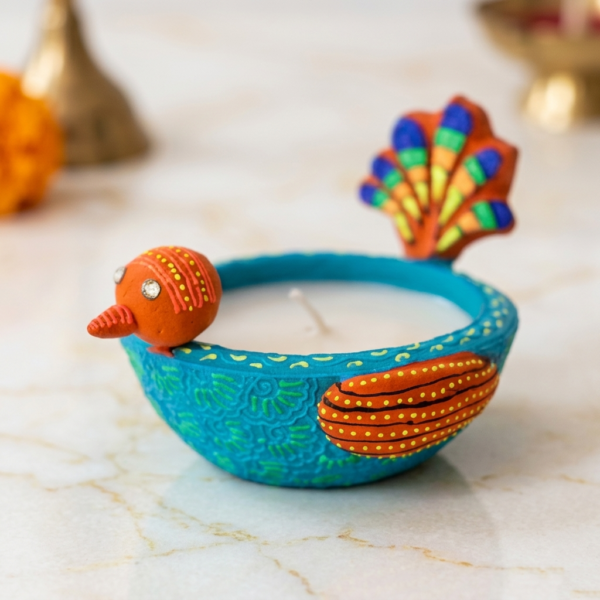 Handmade terracotta bird candle holder