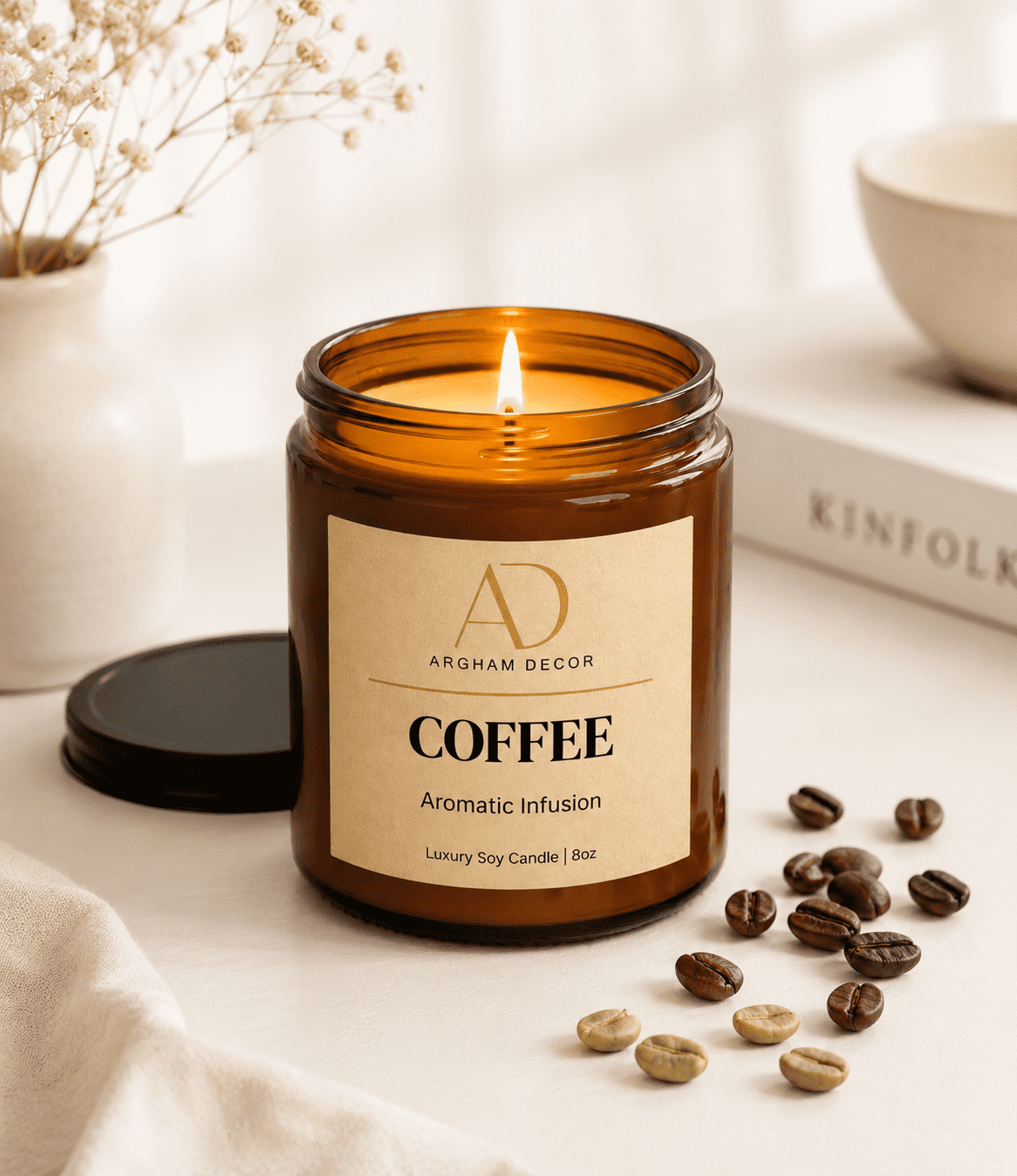 Luxury coffee scented candle lit in amber glass jar